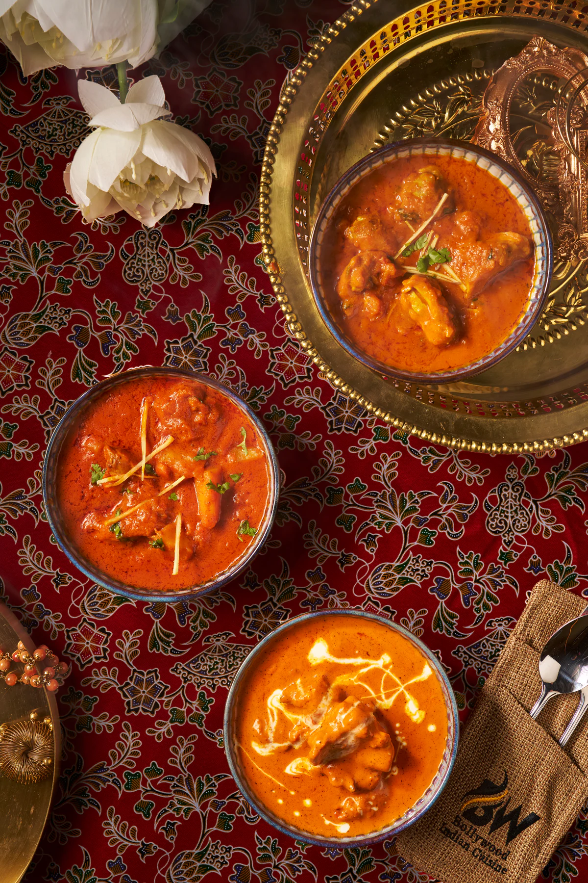 Three Indian curries photographed from above